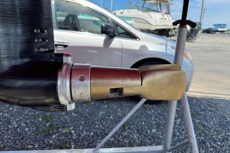 Slide: The Image of Close-up of a 2006 Alerion Express 28 sailboat propeller on a stand. - 9