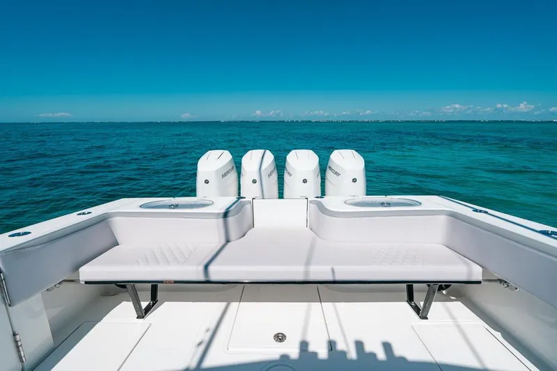 Slide: The Image of 2024 SeaHunter 39 Tournament boat with quad Mercury engines on open ocean. - 17