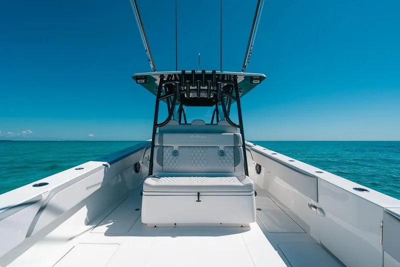 Slide: The Image of 2024 SeaHunter 39 Tournament boat on open ocean, clear blue sky. - 20