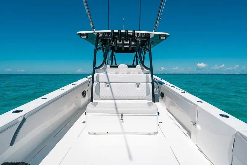 Slide: The Image of 2024 SeaHunter 39 Tournament boat on clear blue ocean waters. - 24