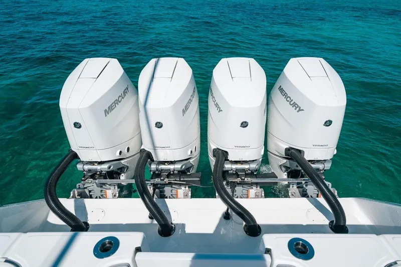 Slide: The Image of Four Mercury Verado outboard engines on a 2024 SeaHunter 39 Tournament boat. - 26
