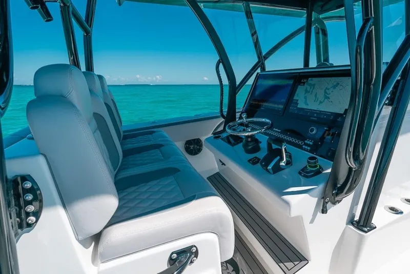 Slide: The Image of 2024 SeaHunter 39 Tournament boat interior with advanced navigation system and luxurious seating. - 31