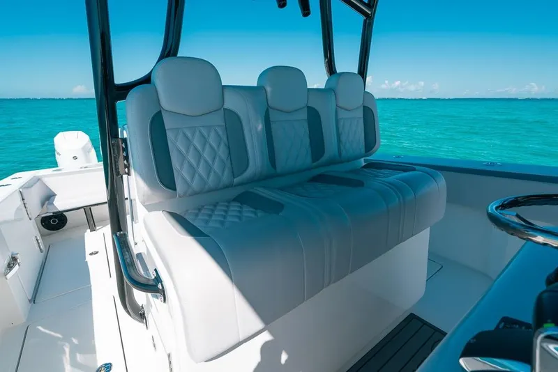 Slide: The Image of 2024 SeaHunter 39 Tournament boat interior with luxurious seating and ocean view. - 32