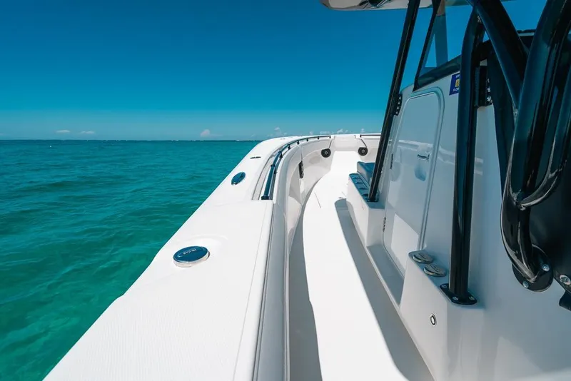 Slide: The Image of 2024 SeaHunter 39 Tournament boat on clear blue ocean waters. - 33