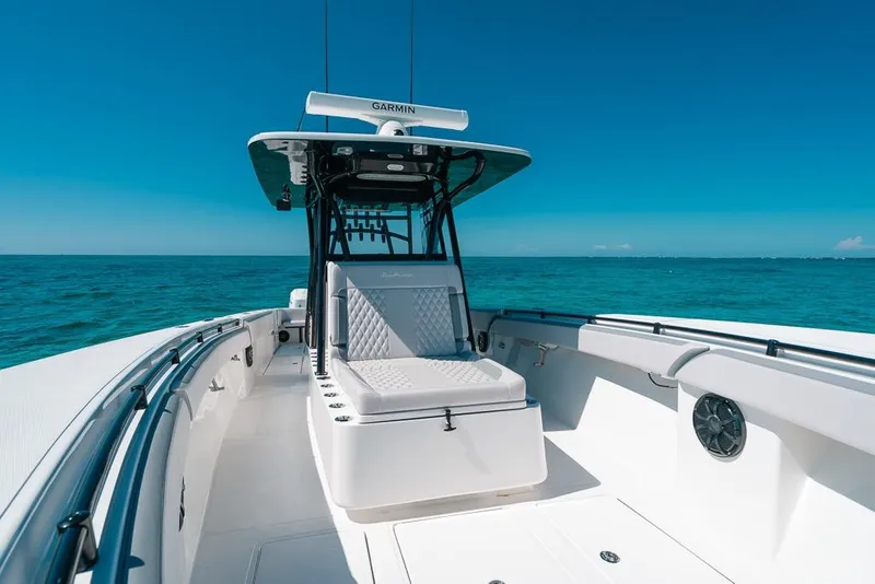 Slide: The Image of 2024 SeaHunter 39 Tournament boat on open ocean, featuring sleek design and advanced navigation. - 38