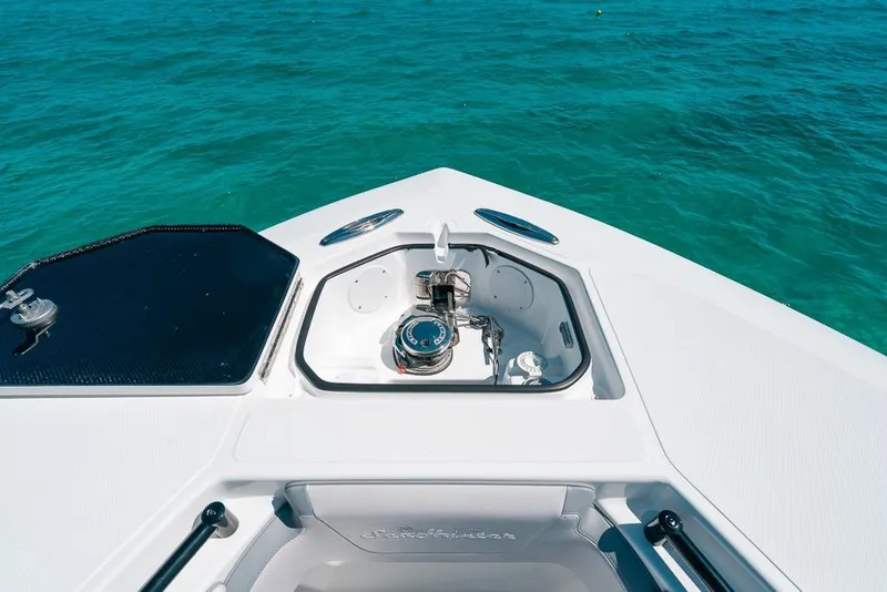 Slide: The Image of 2024 SeaHunter 39 Tournament boat bow with anchor system on clear blue water. - 40