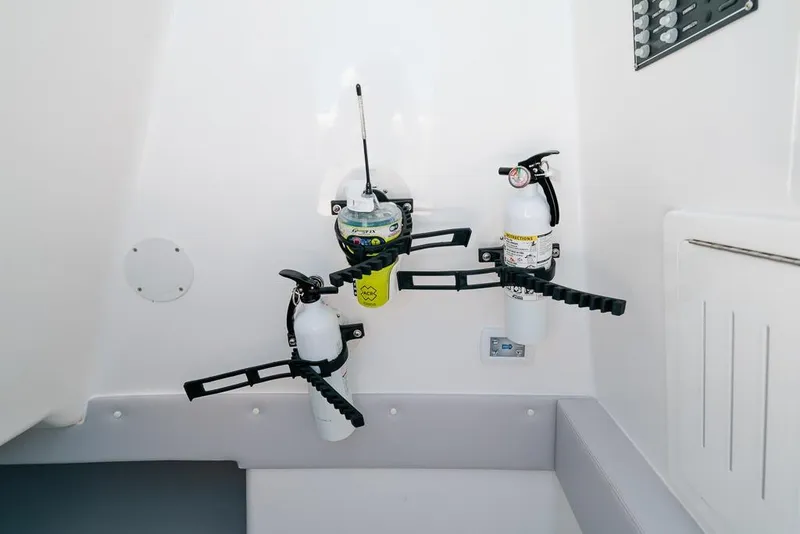 Slide: The Image of Fire extinguishers and safety equipment on 2024 SeaHunter 39 Tournament boat interior. - 41