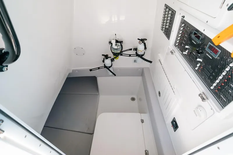 Slide: The Image of 2024 SeaHunter 39 Tournament interior with control panels and storage area. - 43