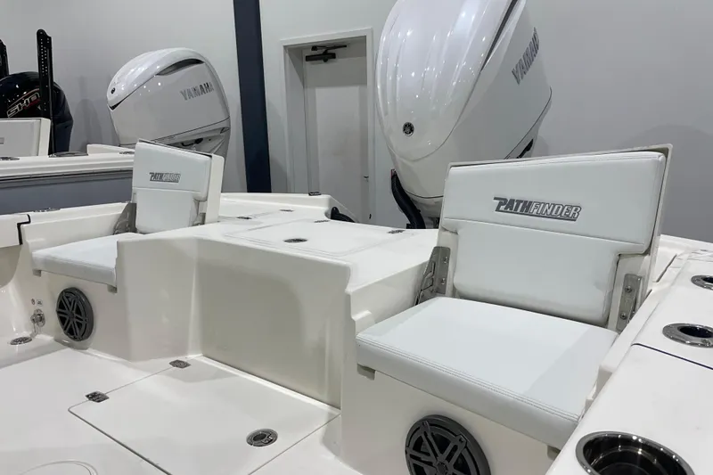 Slide: The Image of 2026 Pathfinder 2500 Hybrid boat interior with Yamaha engines and comfortable seating. - 2