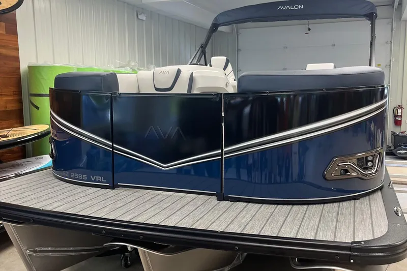 Slide: The Image of 2026 Avalon 25 LSZ Versatile Rear Lounger pontoon boat in showroom. - 7