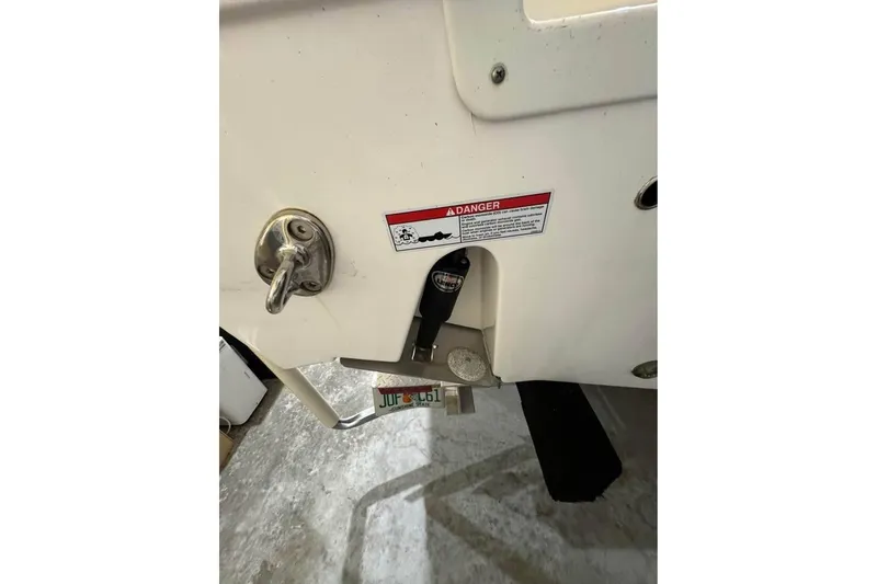 Slide: The Image of Close-up of 2023 Sea Fox 328 Commander boat's stern with warning label. - 3