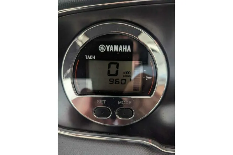 Slide: The Image of Yamaha tachometer display on 2021 Chaparral 230 Suncoast boat dashboard. - 11