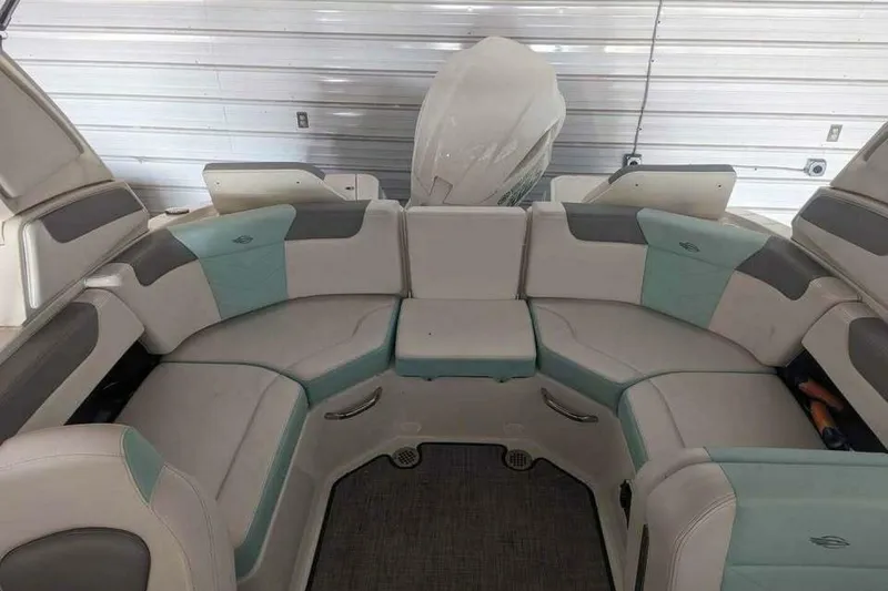 Slide: The Image of 2021 Chaparral 230 Suncoast boat interior with spacious seating and modern design. - 18