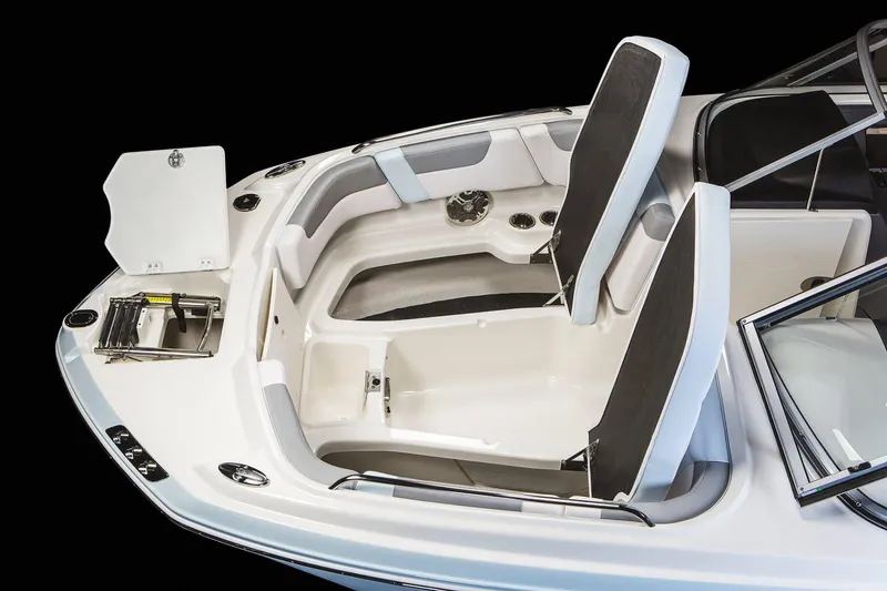 Slide: The Image of Manufacturer Provided Image: 2021 Chaparral 230 Suncoast boat interior seating and storage compartments. - 21