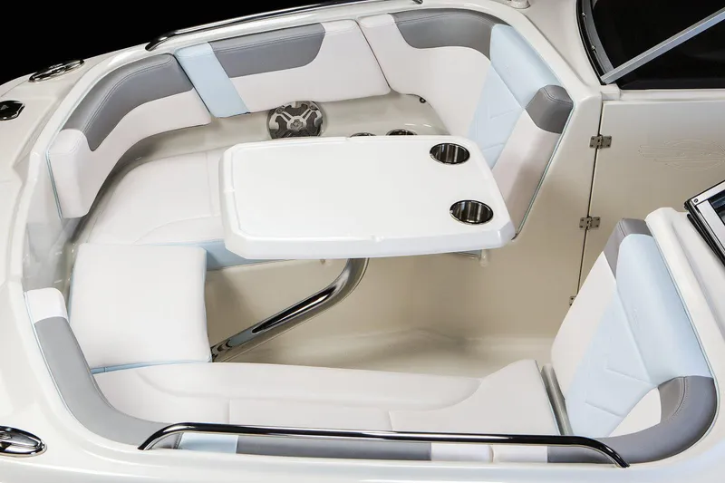 Slide: The Image of Manufacturer Provided Image: 2021 Chaparral 230 Suncoast boat interior with seating and table. - 22