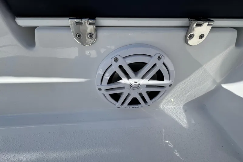 Slide: The Image of 2026 Stingray 173 CC boat speaker with white grille and metal hinges. - 22