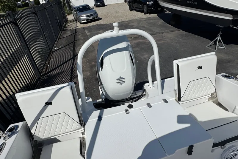 Slide: The Image of 2026 Stingray 173 CC boat with Suzuki outboard motor, featuring white seating and deck. - 5