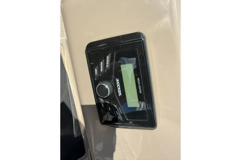 Slide: The Image of Kicker media center on 2023 Sun Tracker Party Barge 20 DLX boat dashboard. - 16