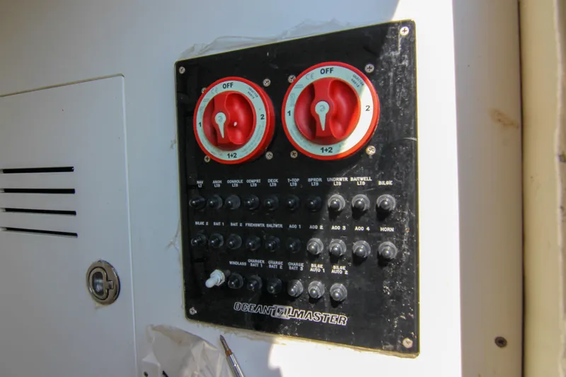 Slide: The Image of Control panel of a 1996 Ocean Master 31 Center Console boat. - 10