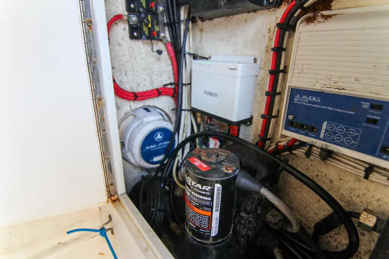 Slide: The Image of Electrical components inside a 1996 Ocean Master 31 Center Console boat. - 13