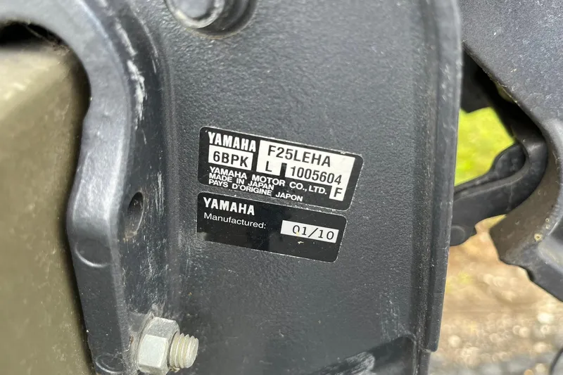Slide: The Image of Yamaha motor label on 2008 Crestliner CR 1648, showing model and manufacturing details. - 14