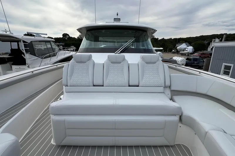 Slide: The Image of 2026 Tiara Yachts 48 LS luxury boat with elegant white seating and modern design. - 46