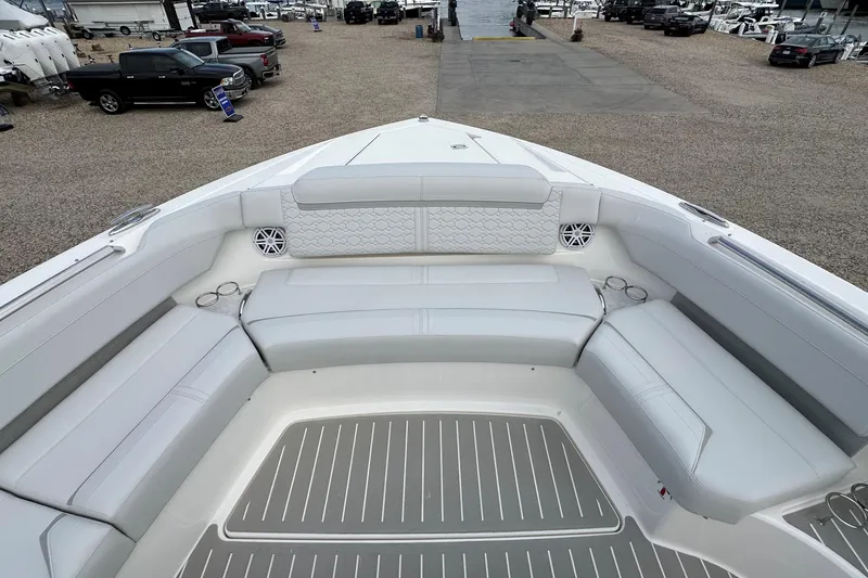 Slide: The Image of Luxurious seating area on 2026 Tiara Yachts 48 LS, featuring elegant white upholstery. - 48