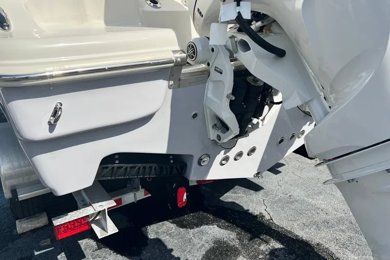 Slide: The Image of 2026 Key West 263 FS boat stern and outboard motor detail. - 10