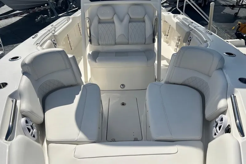 Slide: The Image of Luxurious seating on 2026 Key West 263 FS boat, featuring white leather upholstery. - 21