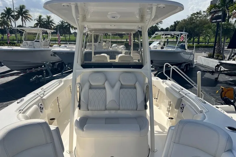 Slide: The Image of 2026 Key West 263 FS boat interior with luxurious seating and modern design. - 22