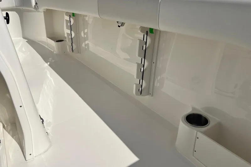 Slide: The Image of 2026 Key West 263 FS boat interior with rod holders and cup holder. - 45