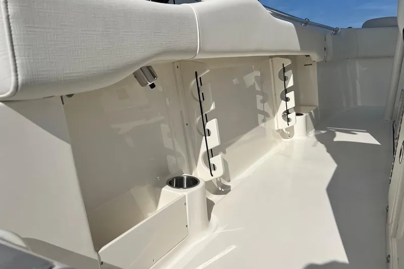 Slide: The Image of 2026 Key West 263 FS boat interior with rod holders and cup holder. - 46