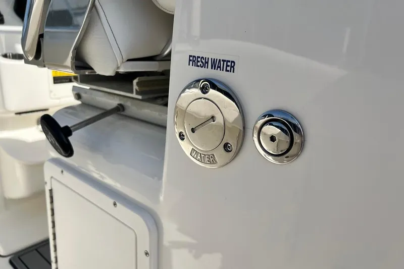 Slide: The Image of 2026 Key West 263 FS boat fresh water access panel. - 49