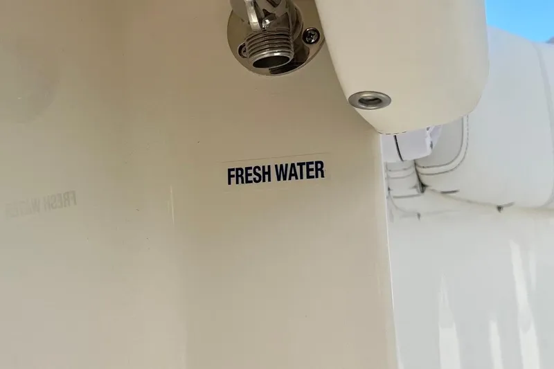 Slide: The Image of 2026 Key West 263 FS boat with fresh water label and fitting. - 50