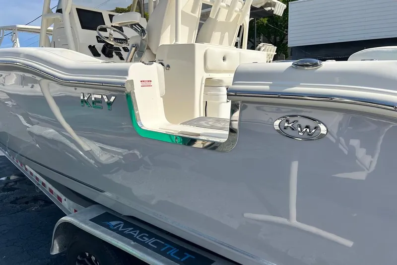 Slide: The Image of 2026 Key West 263 FS boat on trailer, featuring sleek design and modern controls. - 8
