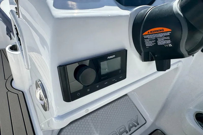 Slide: The Image of Control panel of 2026 Stingray 191 DC boat with Fusion audio system. - 13