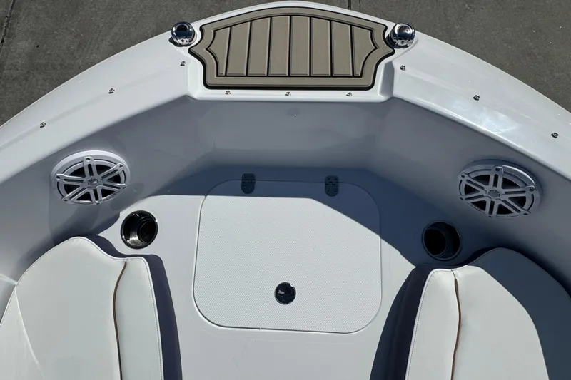 Slide: The Image of 2026 Stingray 191 DC boat interior with speakers and seating. - 18
