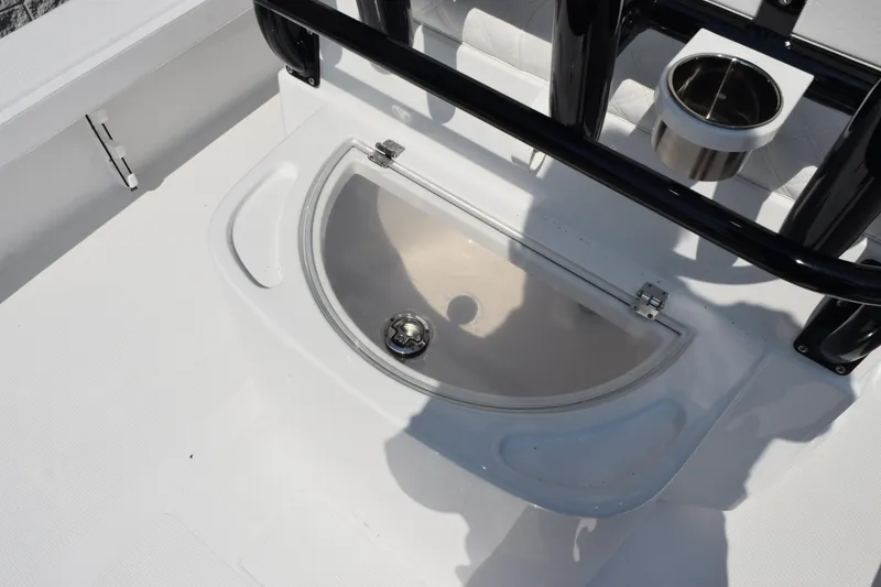 Slide: The Image of Livewell on 2026 BlackJack 256 Coastal boat with cup holder and seating. - 9