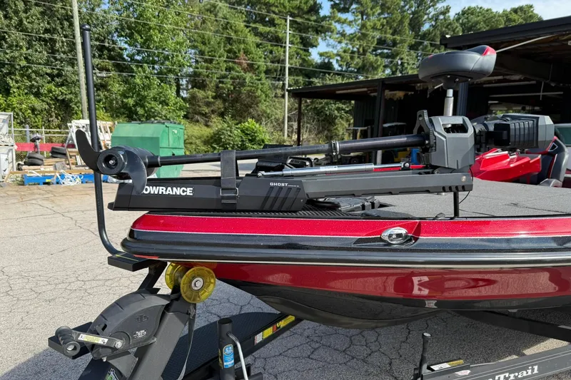 Slide: The Image of 2023 Ranger Z520R boat with Lowrance equipment, parked outdoors on a sunny day. - 11