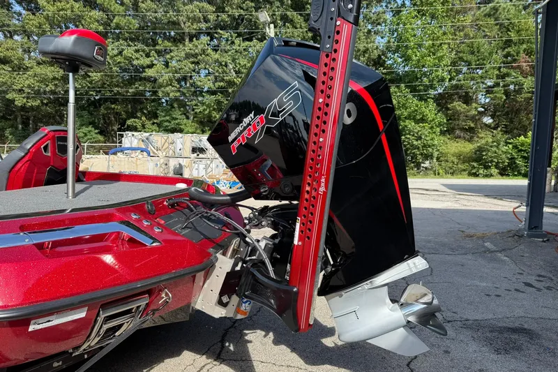 Slide: The Image of 2023 Ranger Z520R boat with Mercury Pro XS engine, parked outdoors. - 3
