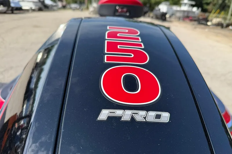 Slide: The Image of Close-up of 2023 Ranger Z520R boat engine with "250 PRO" label. - 5