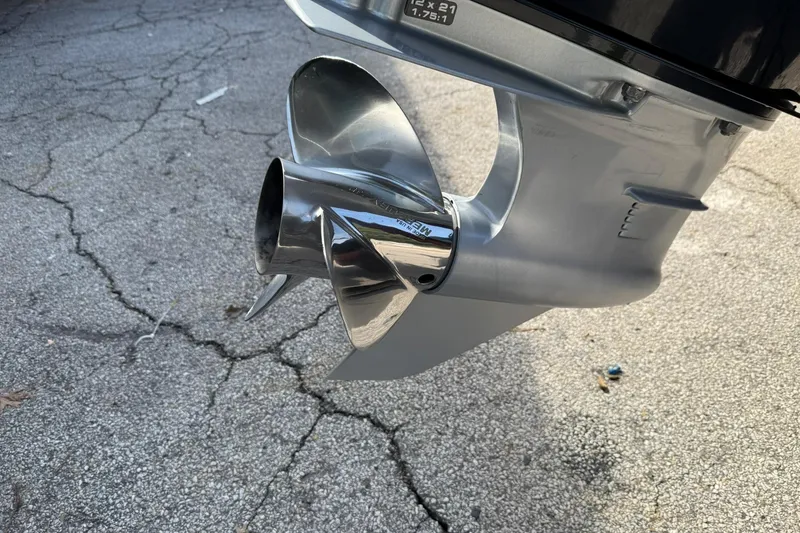 Slide: The Image of 2023 Ranger Z520R boat propeller on cracked pavement background. - 7