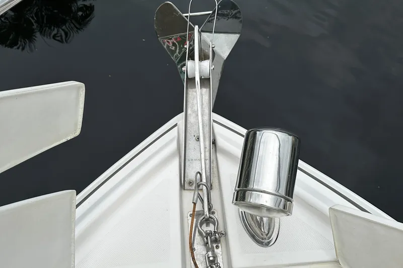 Slide: The Image of Bow of 2016 Regal 35 Sport Coupe with anchor and stainless steel fittings. - 45