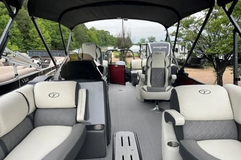 Slide: The Image of 2023 Veranda VP 22RC pontoon boat interior with luxurious seating and canopy. - 11
