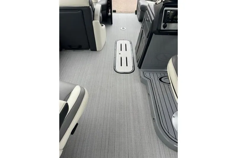 Slide: The Image of 2023 Veranda VP 22RC interior with sleek gray flooring and modern seating. - 2