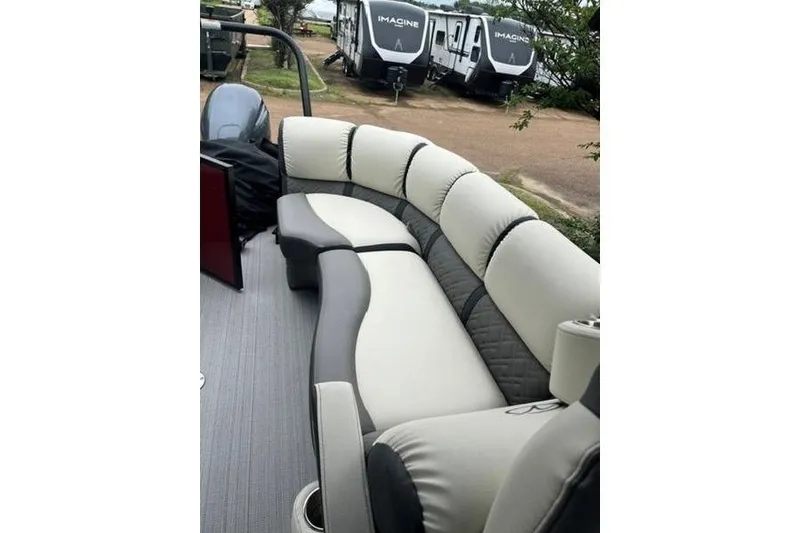Slide: The Image of 2023 Veranda VP 22RC pontoon boat with plush seating and modern design. - 8