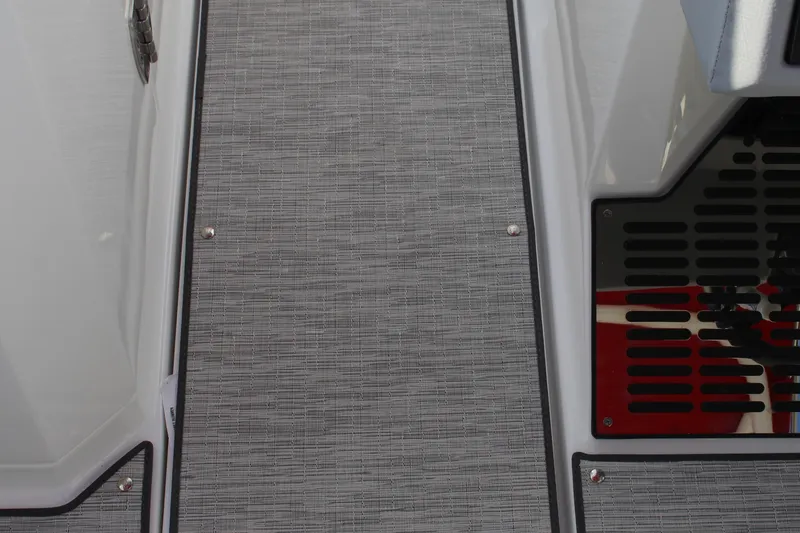 Slide: The Image of 2026 Cobalt R6 boat interior with textured flooring and sleek design elements. - 19