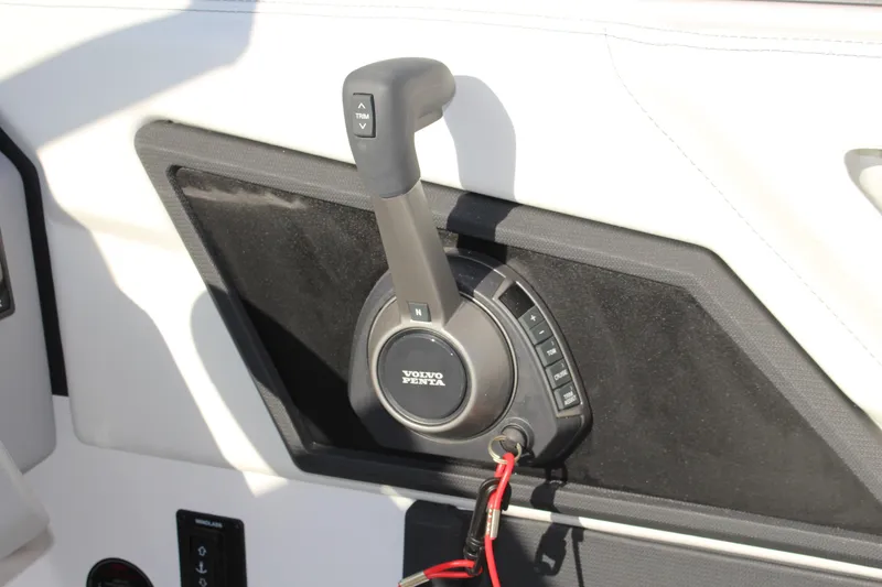 Slide: The Image of Volvo Penta throttle control in 2026 Cobalt R6 boat interior. - 32