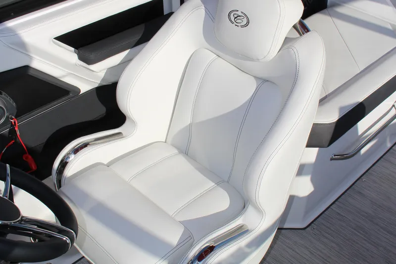 Slide: The Image of Luxurious white captain's seat in 2026 Cobalt R6 boat, featuring sleek design and premium materials. - 33