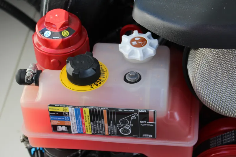 Slide: The Image of Engine compartment of 2026 Cobalt R6 with labeled fluid reservoir and components. - 39